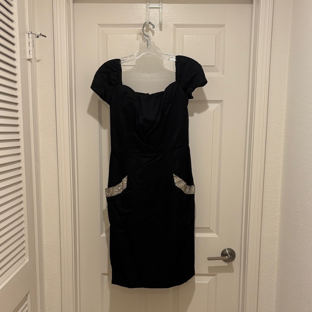 Chic Black Midi Dress with Pocket Accents. Melanie Harris for Rose Taft